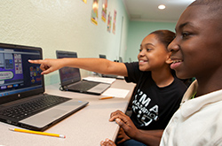Kids on a laptop in education center
